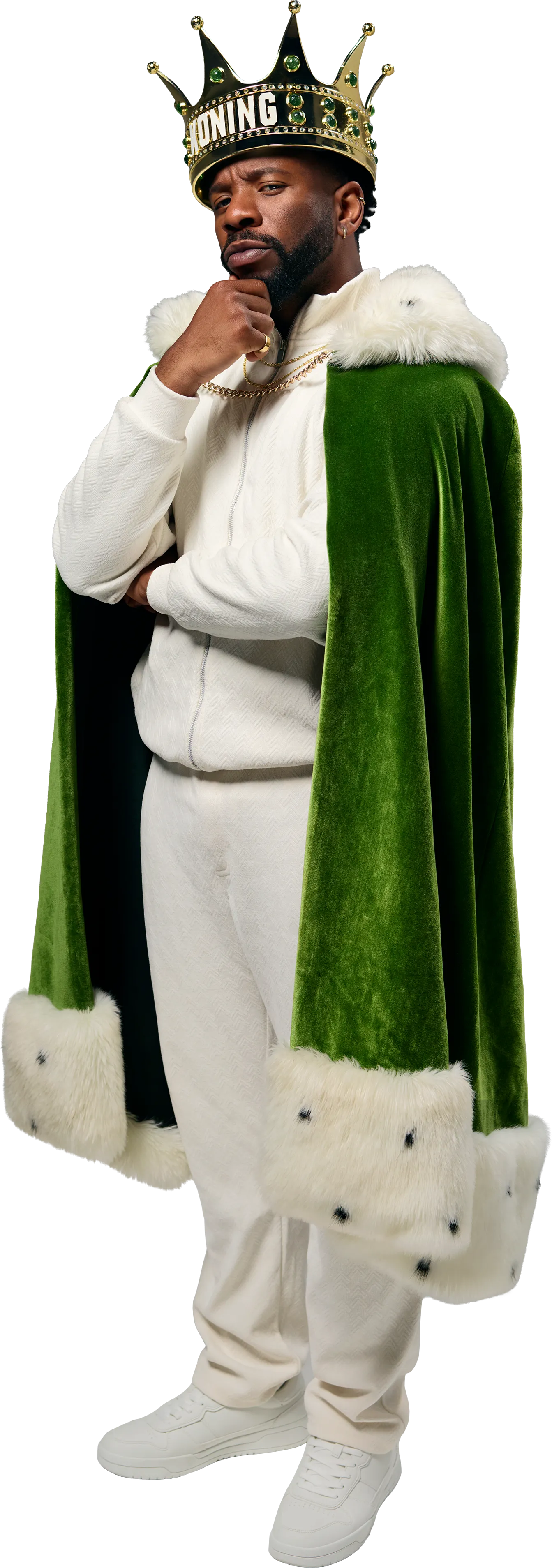 Persoon met koningskroon en groene mantel met bontkraag